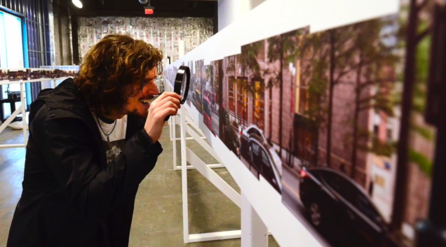 Sean Busher at inspecting the Panorama at the Moment Mile Exhibition