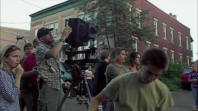 Gregory Crewdson, directing the scene from in front of the camera. 