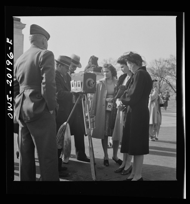 Washington, D.C. Street photographer in front of the Capitol. Esther Bubley, March 1943. 