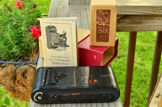 This is what I received in the auction. The box appears original, but although the manual is in excellent condition, it is for a different camera.